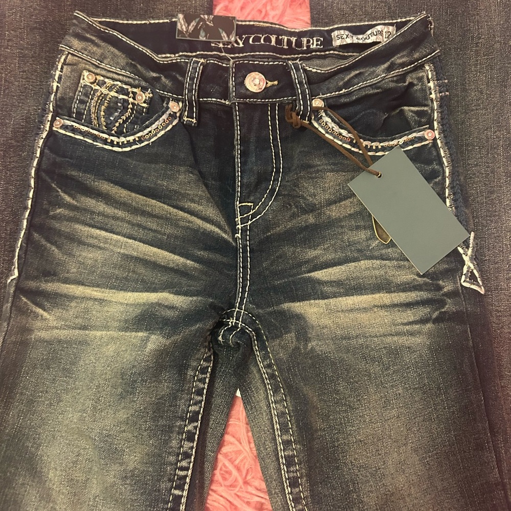 Blue Boot Cut Jeans with Distressed Look